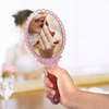 Specchio palmare rosa decorativo ovale