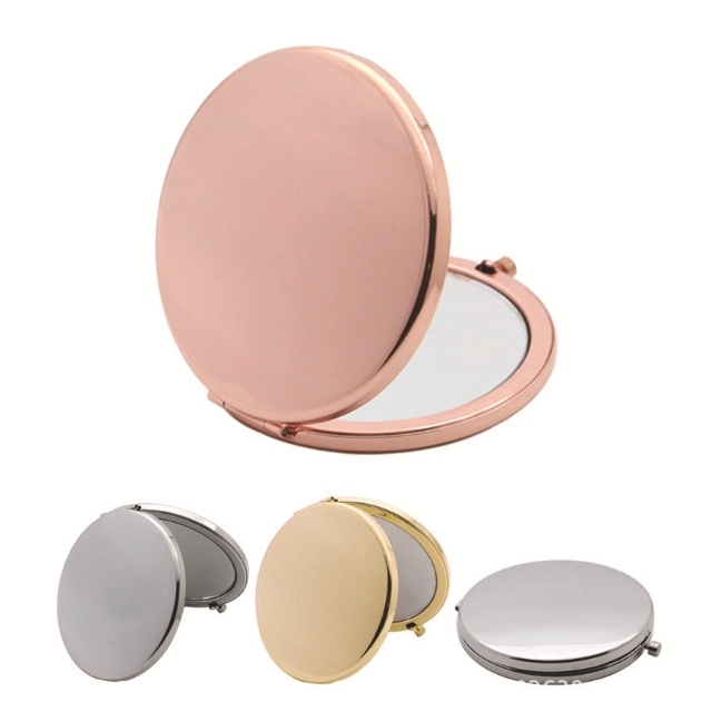 Specchio compatto rotondo a doppia faccia in oro rosa